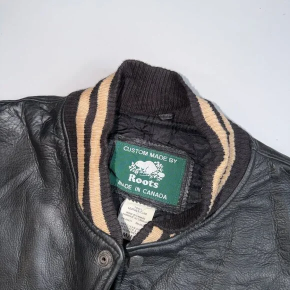 Roots Canada Vintage men's leather bomber varsity jacket with a Beachcomber